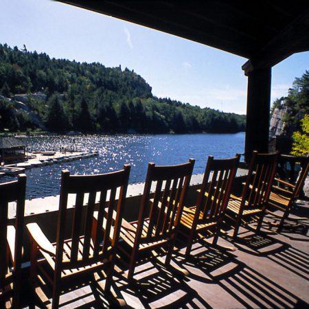 Rocking chairs overlooking mohonk lake at mohonk mountain house