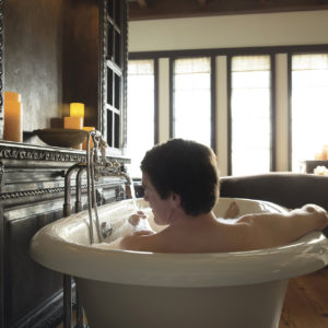 A guest enjoys the gentleman's spa at The Spa at Sea Island