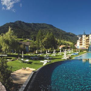Exterior view of facilities and pool at ADLER Spa Resort DOLOMITI