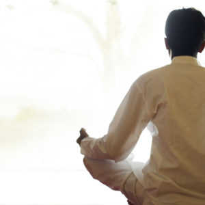 A man in a yoga pose at ADLER Spa Resort THERMAE