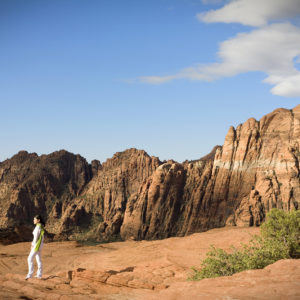 A guest reflects on the rocks at Red Mountain Resort
