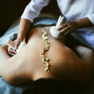 A guest enjoys a massage at The Spa at 1440 Multiversity